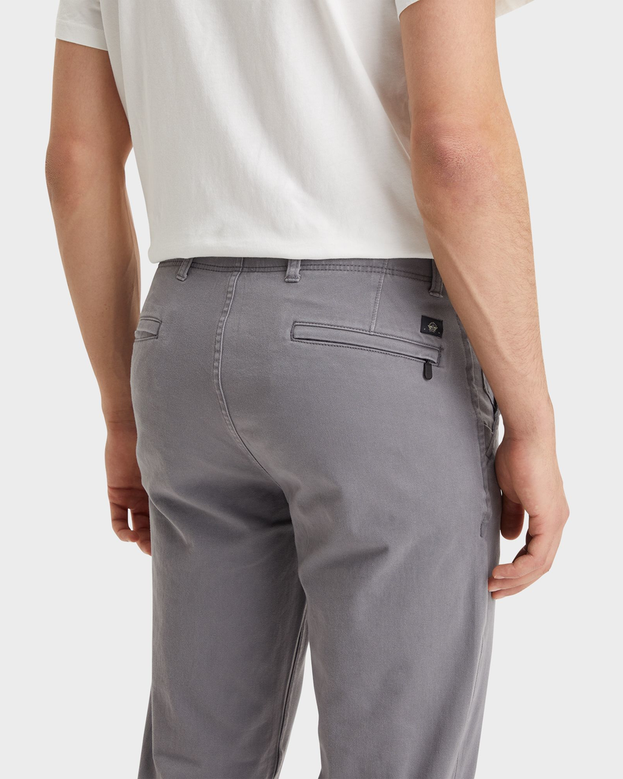 View of model wearing Burma Grey Men's Slim Fit Smart 360 Flex Alpha Khaki Pants.