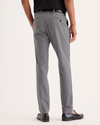 Back view of model wearing Burma Grey Signature Iron Free Khakis, Skinny Fit with Stain Defender®.