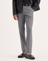 Front view of model wearing Burma Grey Signature Iron Free Khakis, Skinny Fit with Stain Defender®.