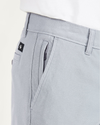 View of model wearing Burma Grey Smart 360 Flex Comfort Knit Chino Pants, Slim Fit.