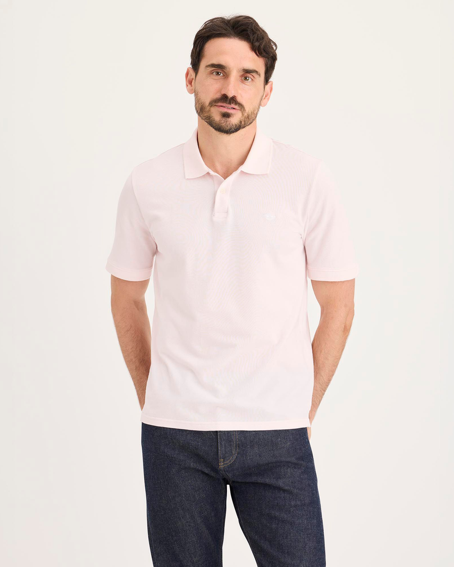 Front view of model wearing Calcite Pique Polo, Slim Fit.