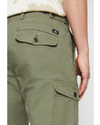 View of model wearing Camo Men's Slim Tapered Fit Cargo Pants.