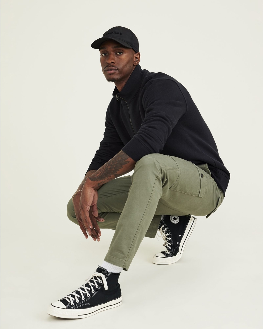 View of model wearing Camo Men's Slim Tapered Fit Cargo Pants.