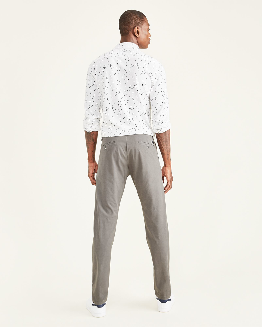 Back view of model wearing Car Park Grey Crafted Khaki Pants, Tapered Fit.