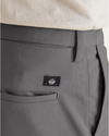 View of model wearing Car Park Grey Signature Go Khaki Pants, Slim Fit.
