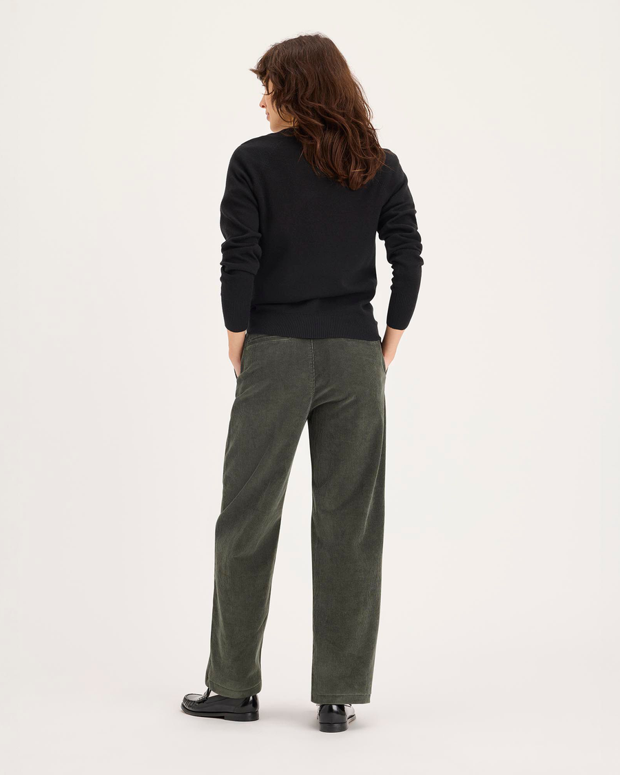 Back view of model wearing Chimera Blake Chino, High Straight Fit.