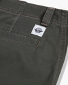 View of model wearing Chimera Eighty-Six Alpha Chino Pants, Loose Fit.
