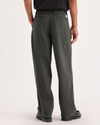 Back view of model wearing Chimera Eighty-Six Alpha Chino Pants, Loose Fit.
