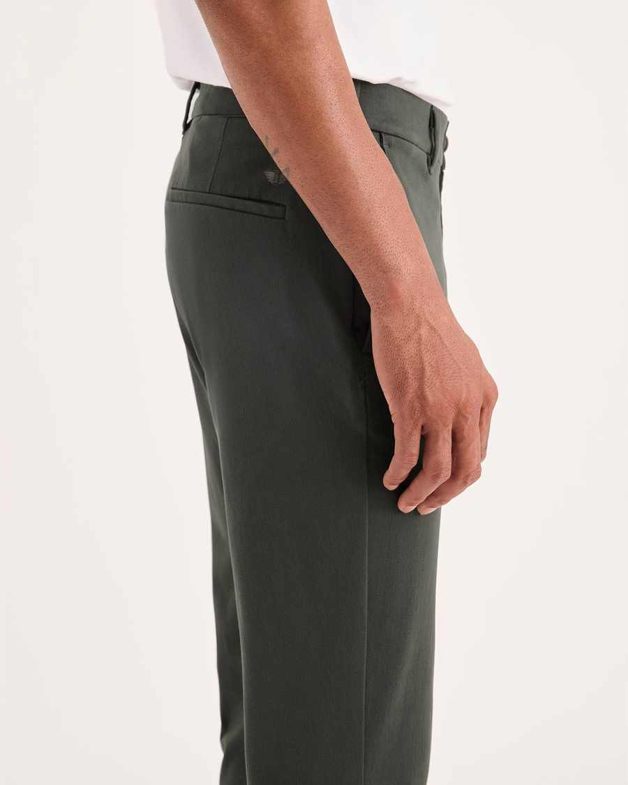 Side view of model wearing Chimera Go Activeflex Chino, Skinny Fit.