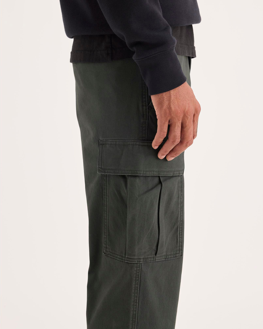 Side view of model wearing Chimera Utility Cargo Pant, Straight Fit.