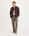Front view of model wearing Chocolate Chip Crafted Khaki Pants, Slim Fit.