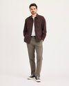 Front view of model wearing Chocolate Chip Crafted Khaki Pants, Slim Fit.