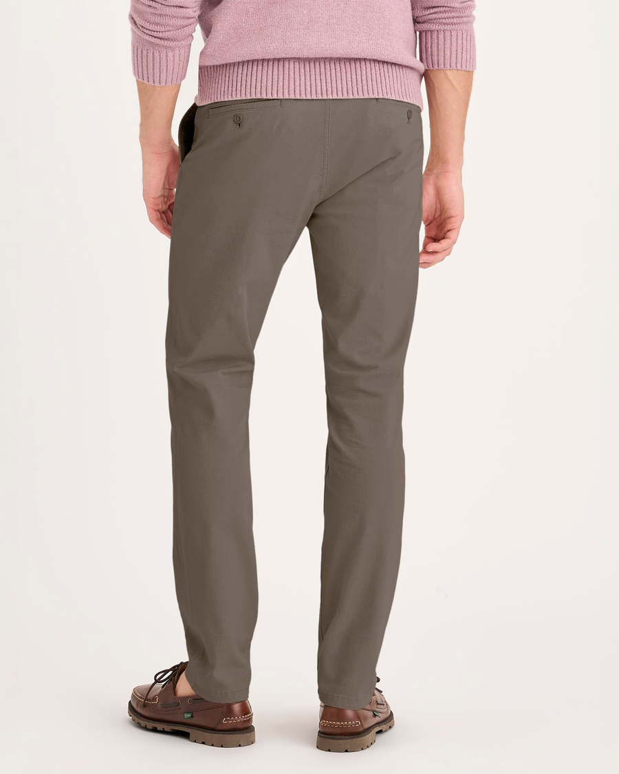 Back view of model wearing Chocolate Chip Essential Chino Pants, Skinny Fit.