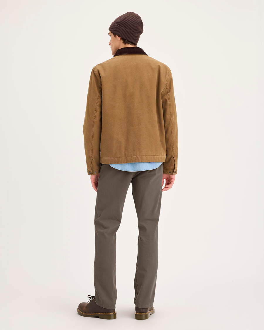 Back view of model wearing Chocolate Chip Essential Chino Pants, Slim Fit.