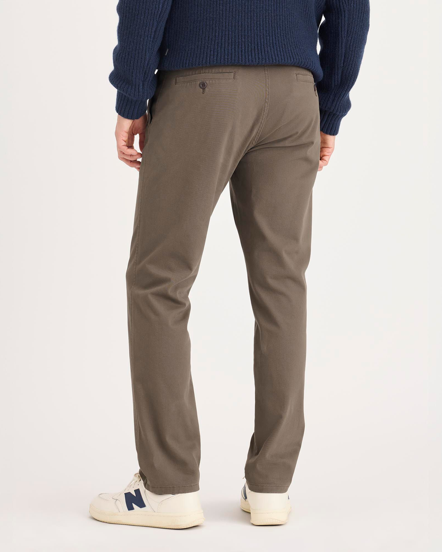Back view of model wearing Chocolate Chip Ultimate Chinos, Slim Fit.