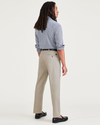 Back view of model wearing Cloud Signature Iron Free Khakis, Creased, Slim Fit with Stain Defender®.