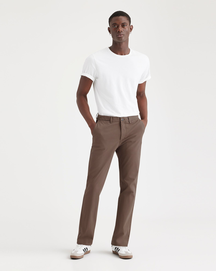 Front view of model wearing Coffee Quartz Men's Slim Fit Smart 360 Flex Alpha Chino Pants.