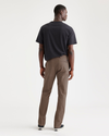 Back view of model wearing Coffee Quartz Men's Slim Fit Smart 360 Flex California Chino Pants.