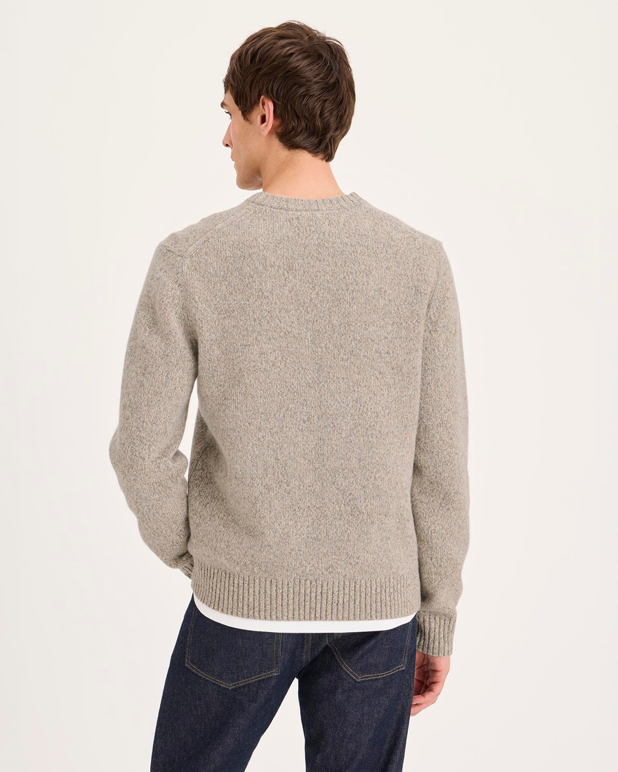 Back view of model wearing Cotswold Stone Premium Crewneck Sweater, Regular Fit.