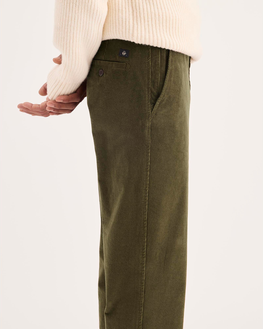 Side view of model wearing Dark Moss Ultimate Chino Pants with Smart 360 Flex™, Slim Fit.