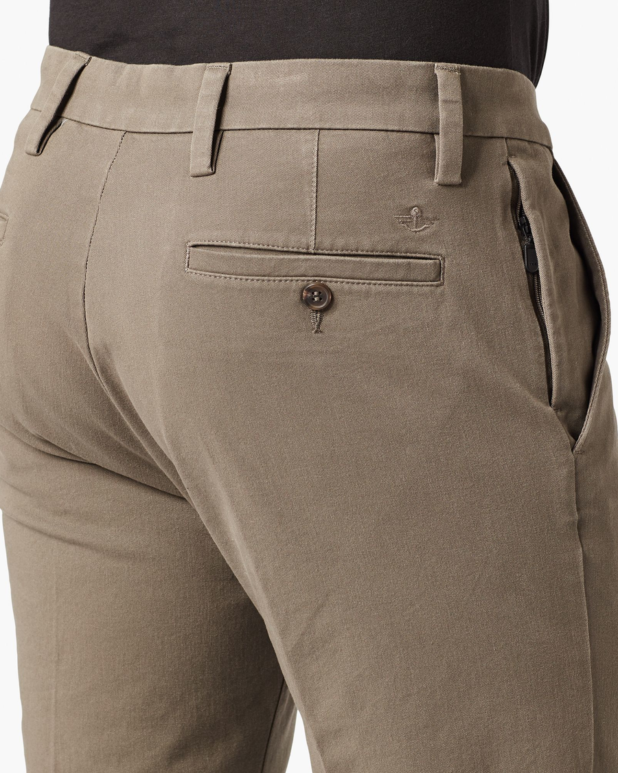 View of model wearing Dark Pebble Workday Khaki Pants, Slim Fit.