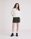 Front view of model wearing Deep Forest Women's Button Front Mini Skirt.