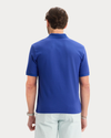 Back view of model wearing Deep Ultramarine Original Polo, Slim Fit.