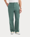 Front view of model wearing Duck Green Eighty-Six Original Chino Pants, Loose Fit.