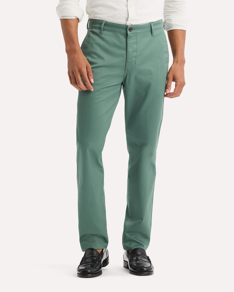 View of model wearing Duck Green Original Chino Pants, Slim Fit.