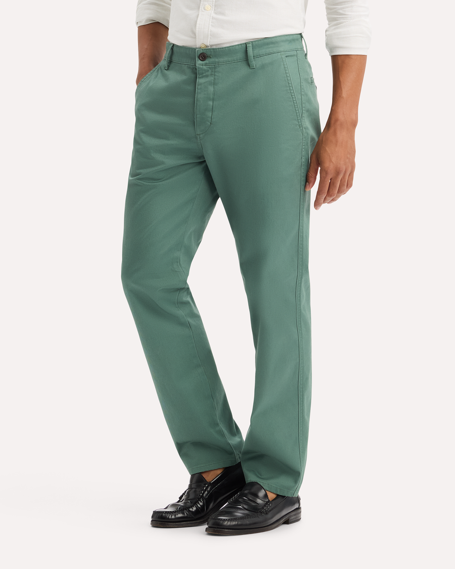 View of model wearing Duck Green Original Chino Pants, Slim Fit.