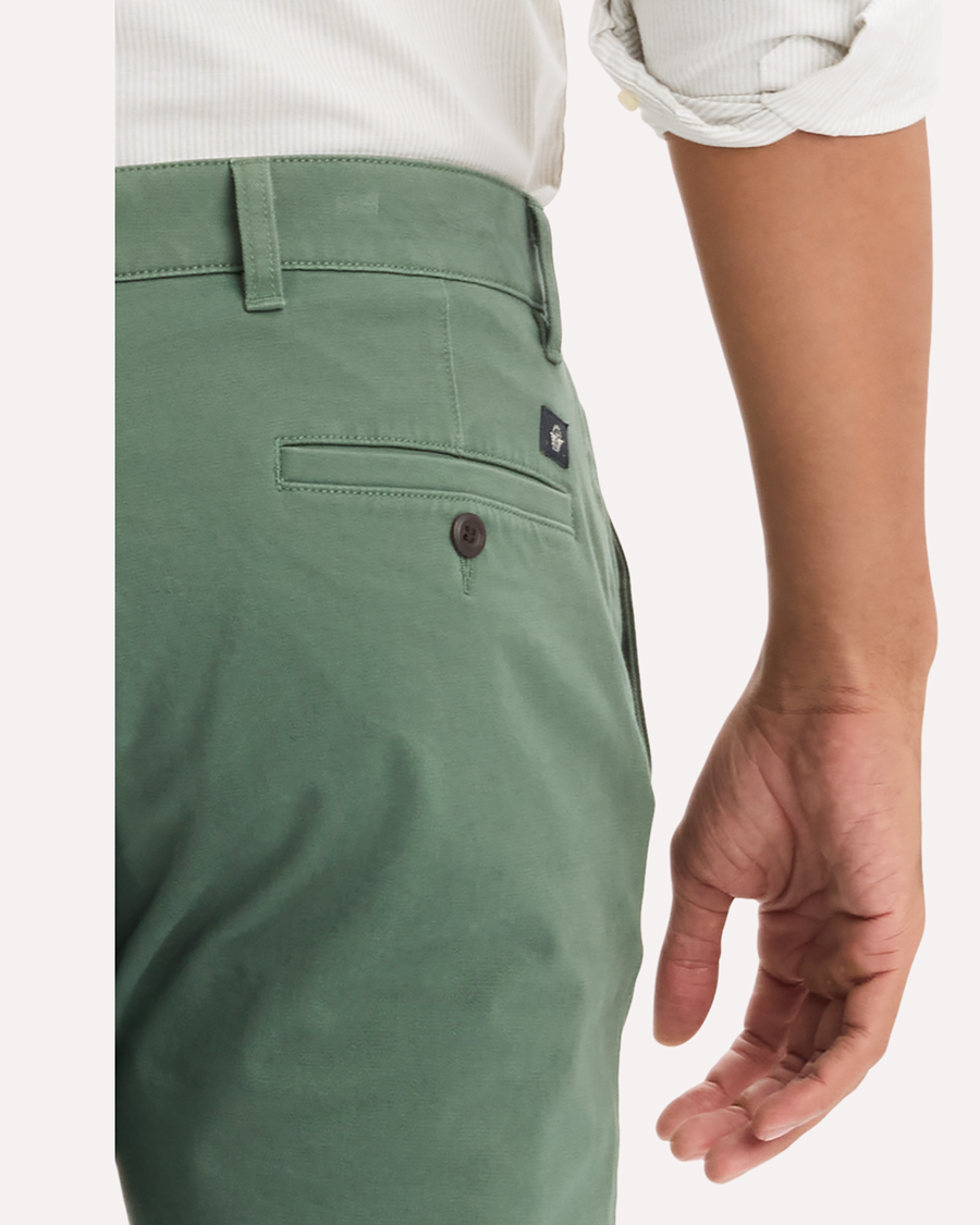 View of model wearing Duck Green Ultimate Chinos, Skinny Fit.
