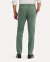Back view of model wearing Duck Green Ultimate Chinos, Skinny Fit.