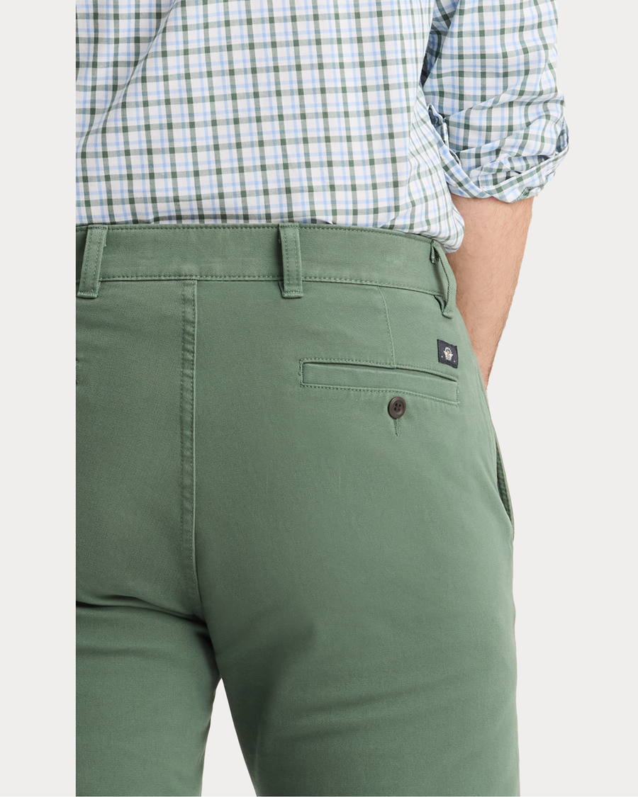 View of model wearing Duck Green Ultimate Chinos, Slim Fit.