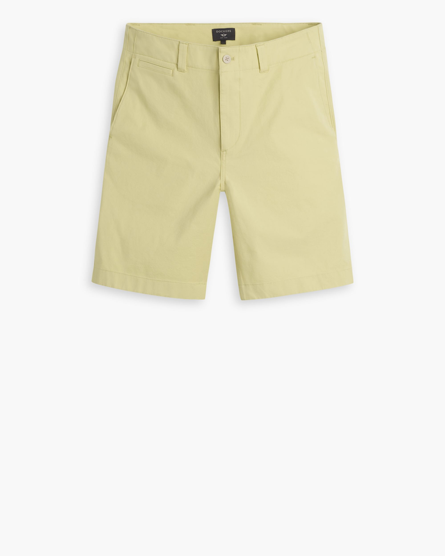 View of model wearing Dusty Yellow Alpha Chino Shorts, Straight Fit.