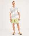 Front view of model wearing Dusty Yellow Alpha Chino Shorts, Straight Fit.