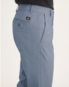 Side view of model wearing Folkstone Gray Original Chino Pants, Skinny Fit.