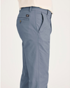 Side view of model wearing Folkstone Gray Original Chino Pants, Slim Fit.