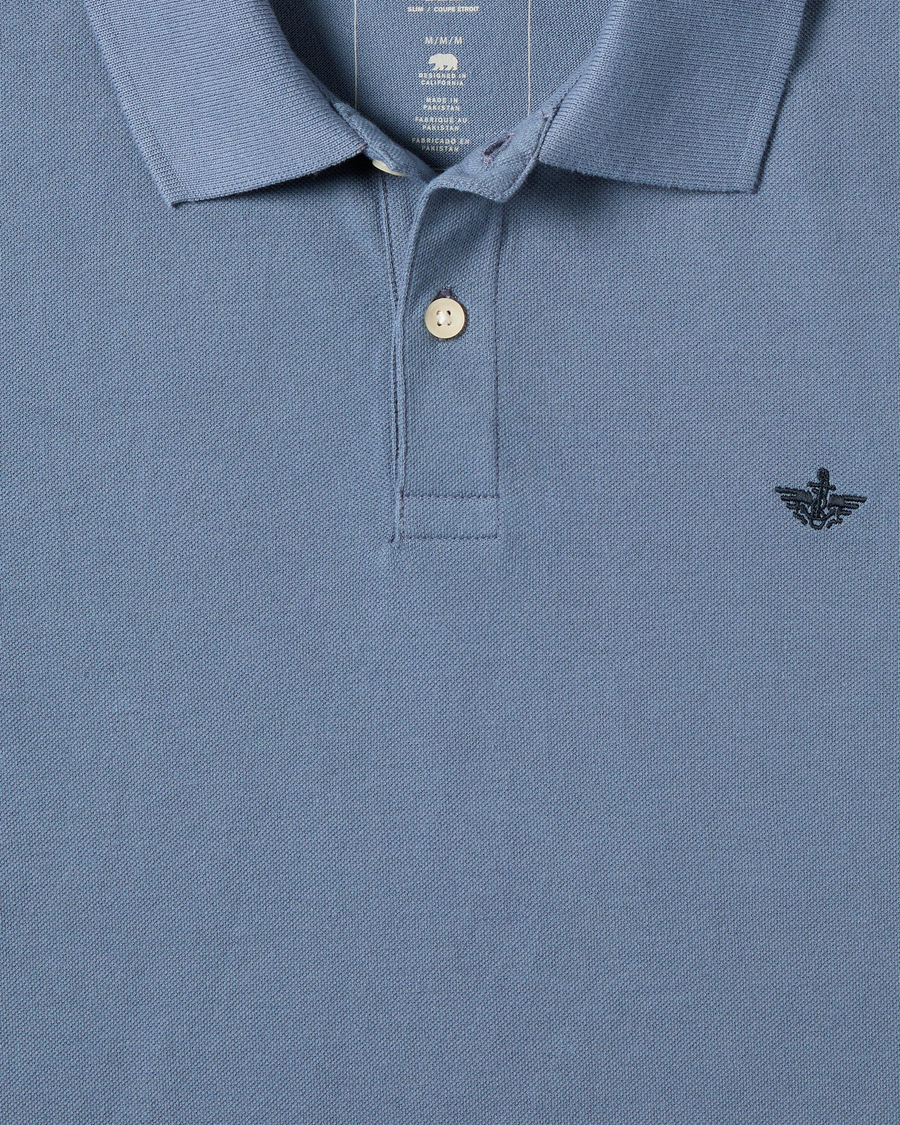 View of model wearing Folkstone Gray Pique Polo, Slim Fit.