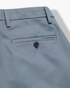 View of model wearing Folkstone Gray Signature Iron Free Khakis, Slim Fit with Stain Defender®.