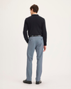 Back view of model wearing Folkstone Gray Signature Iron Free Khakis, Slim Fit with Stain Defender®.