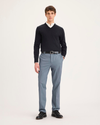 Front view of model wearing Folkstone Gray Signature Iron Free Khakis, Slim Fit with Stain Defender®.
