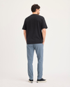 Back view of model wearing Folkstone Gray Ultimate Chino Pants with Smart 360 Flex™, Skinny Fit.