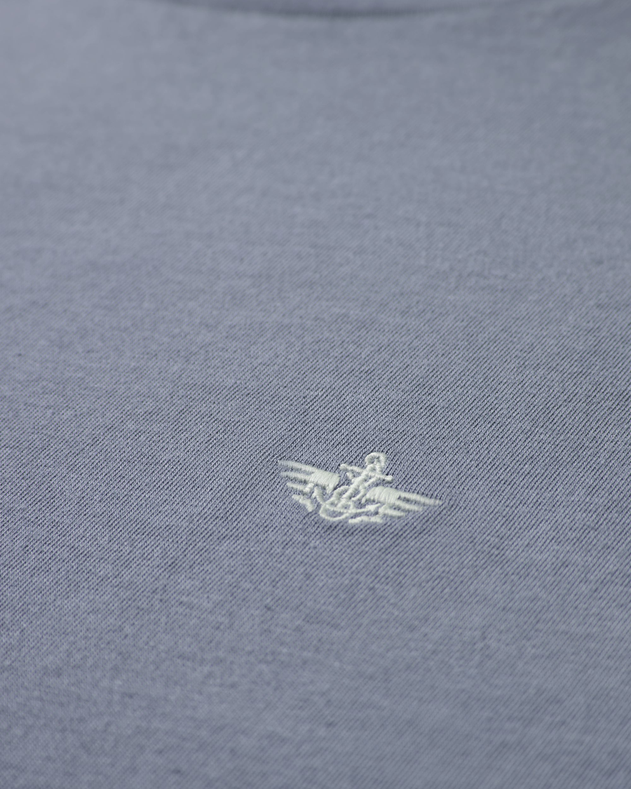 View of model wearing Folkstone Grey Original Tee.