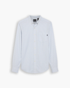 View of model wearing Gresham Subdued Blue Lucent White Oxford Shirt, Slim Fit.