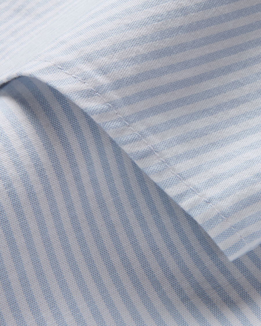 View of model wearing Gresham Subdued Blue Lucent White Oxford Shirt, Slim Fit.