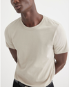View of model wearing Grit Men's Slim Fit Icon Tee Shirt.