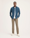 Front view of model wearing Harvest Gold Men's Skinny Fit Original Chino Pants.