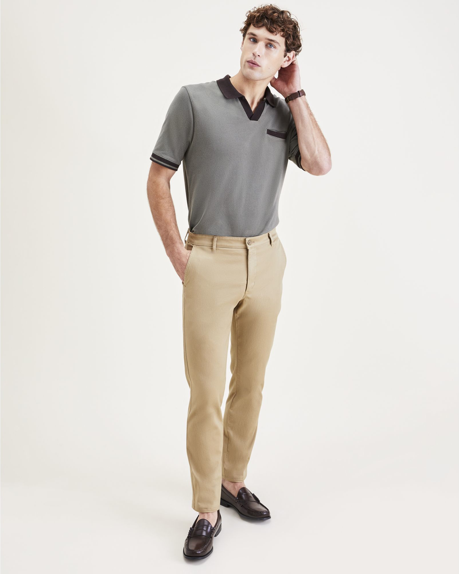 View of model wearing Harvest Gold Men's Slim Fit Original Chino Pants.