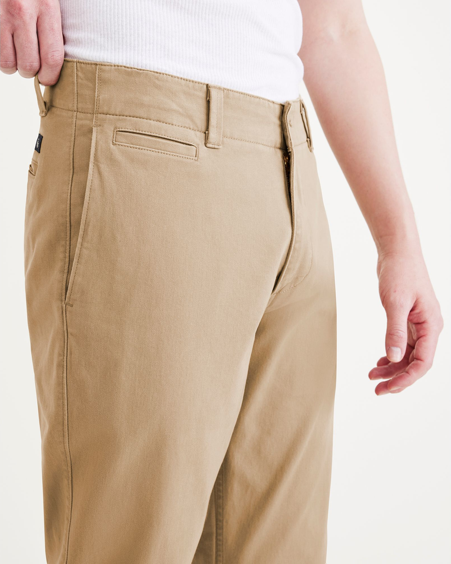 View of model wearing Harvest Gold Men's Slim Fit Smart 360 Flex California Chino Pants.