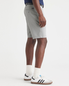 Side view of model wearing High-Rise Men's Supreme Flex Modern Chino Short.